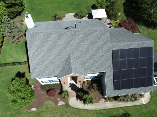 New Jersey residence with solar panels on roof.