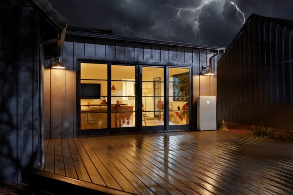 Powerwall 3 on outside of home during a storm