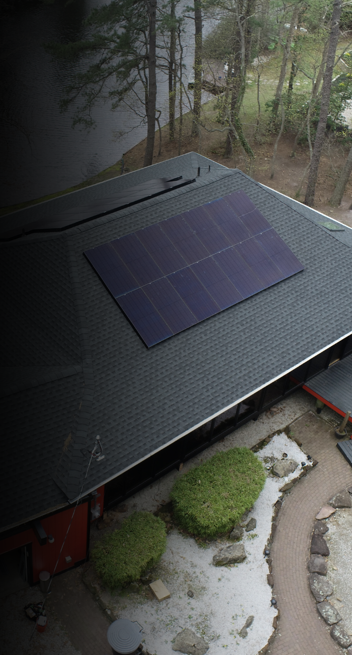 home with rooftop solar panels